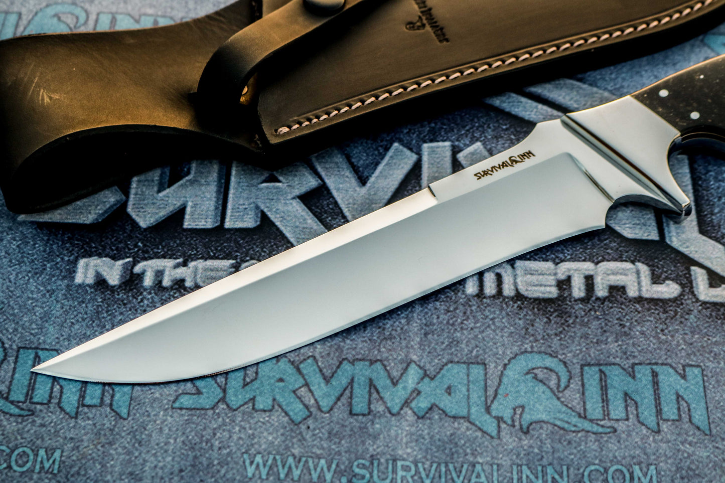 Razor-sharp high carbon steel Bowie blade with mirror finish, paired with premium micarta grip