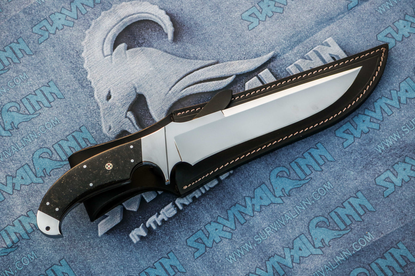 Custom Bowie knife with galaxy micarta handle and handcrafted leather sheath for protection