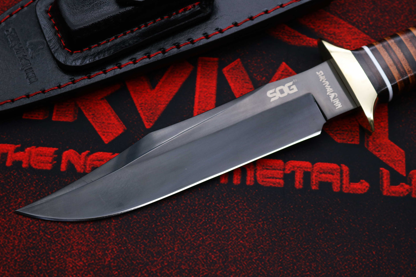 Razor-sharp Bowie knife blade with polished edge and precision-forged clip point tip