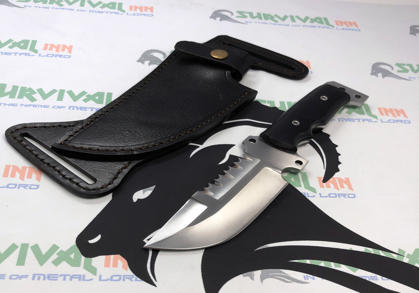 Tactical hunting knife placed on a tree stump with forest background, survival gear setup