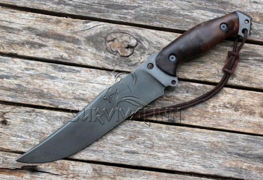 High-performance handmade Bowie knife with contoured rosewood handle and rugged leather sheath for storage