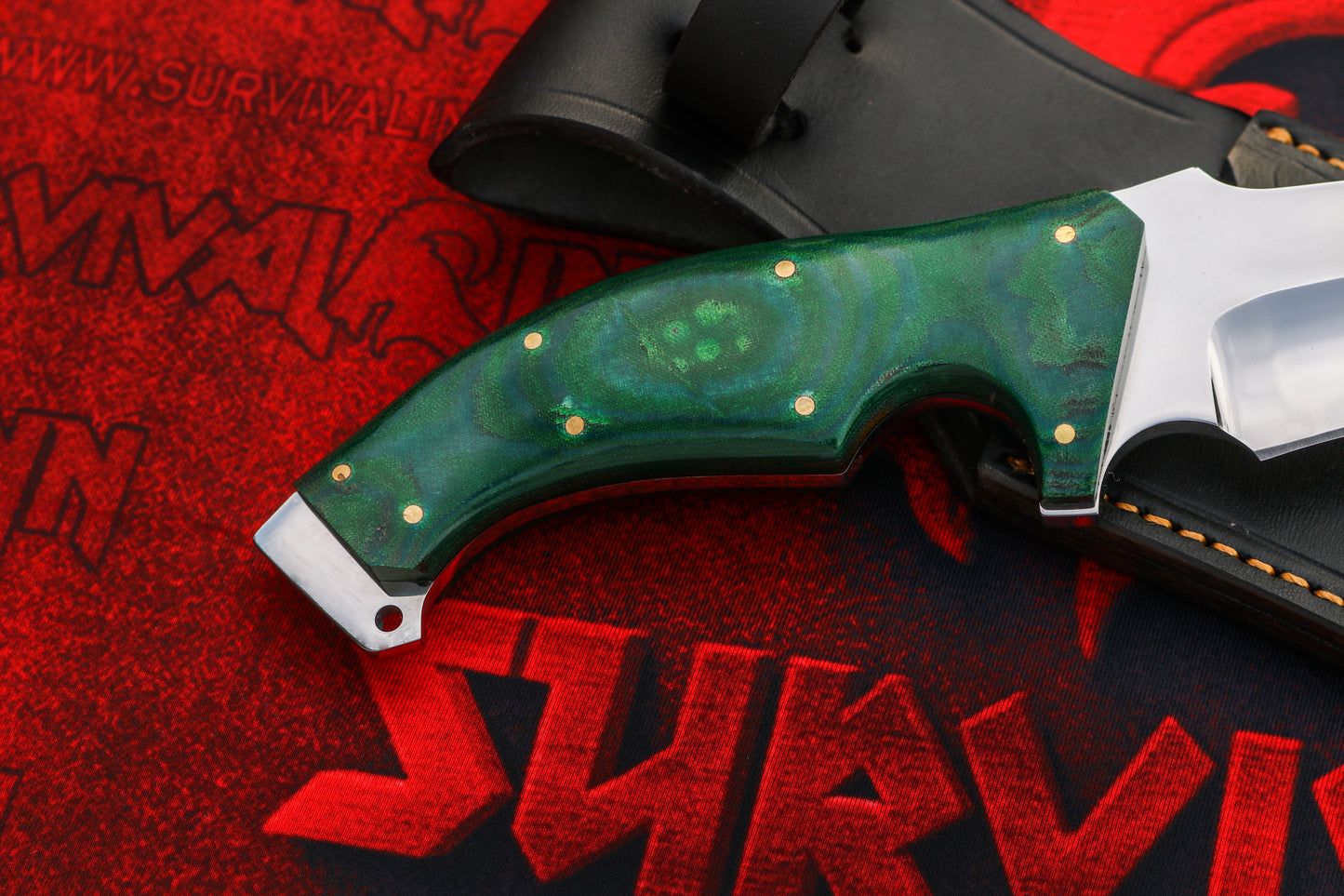 Detailed view of custom Bowie knife handle Green micarta scales and Brass pins for secure grip and balance