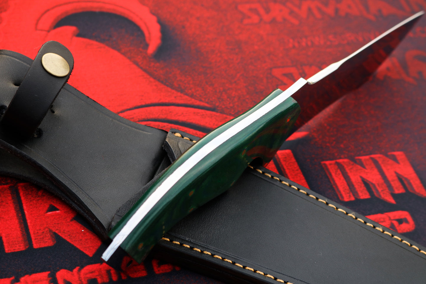 Handcrafted Bowie knife spine and blade detail showing heavy-duty D2 steel construction