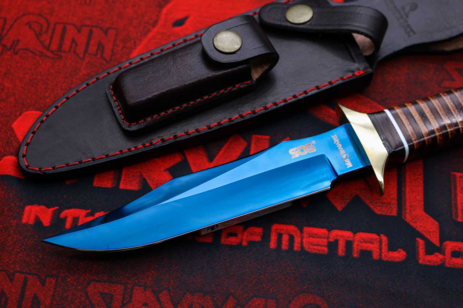 Cold Steel SOG Bowie knife with blued fixed blade and stacked leather handle, full tang design