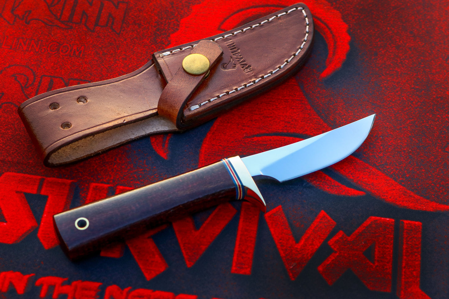 Randall Model 20 Yukon Skinner knife displayed with leather sheath and Micarta handle