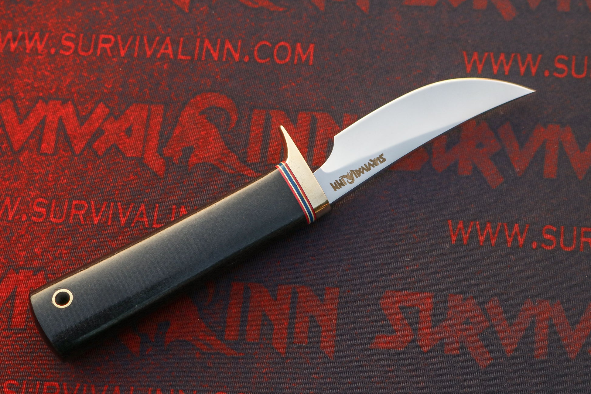 Randall Made Knives Model 20 hunting knife with Micarta handle and duralumin butt cap