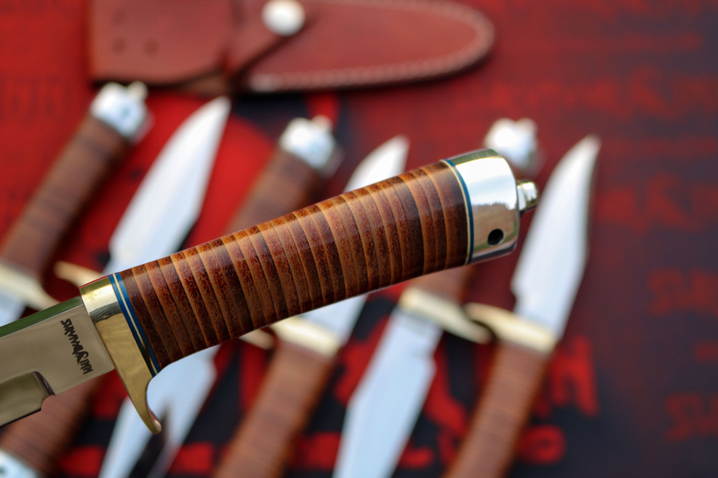 Ergonomic stacked leather handle on a Randall Model 8, providing a secure grip for field use