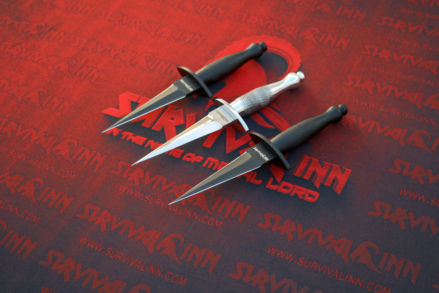 Close-up of the needle-sharp point and precision grind on the D2 steel Fairbairn-Sykes dagger