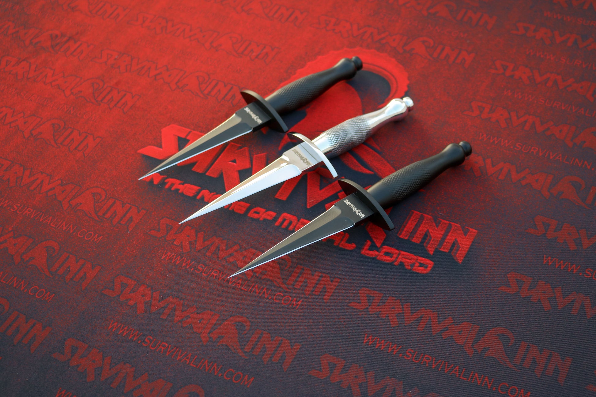 Close-up of the needle-sharp point and precision grind on the D2 steel Fairbairn-Sykes dagger