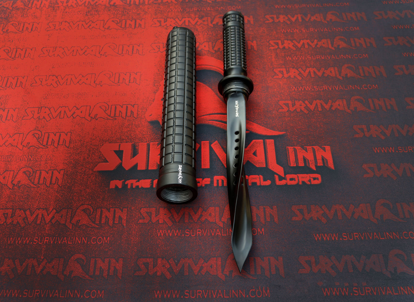 Detailed view of the twisted triangular blade tip of the tri-dagger