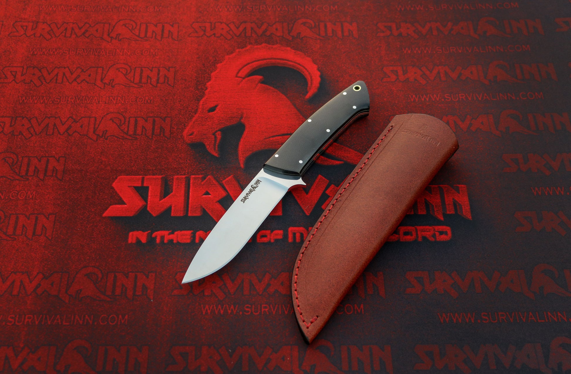 Loveless Drop Point Hunter knife with [Handle Material, Walnut wood scales and a stainless guard