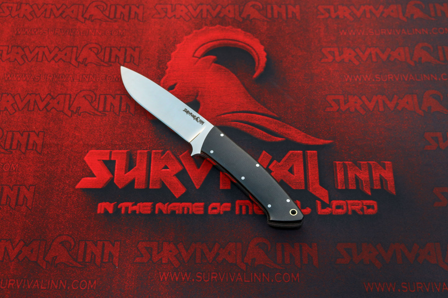 Loveless Drop Point Hunter with tapered tang and stainless steel guard