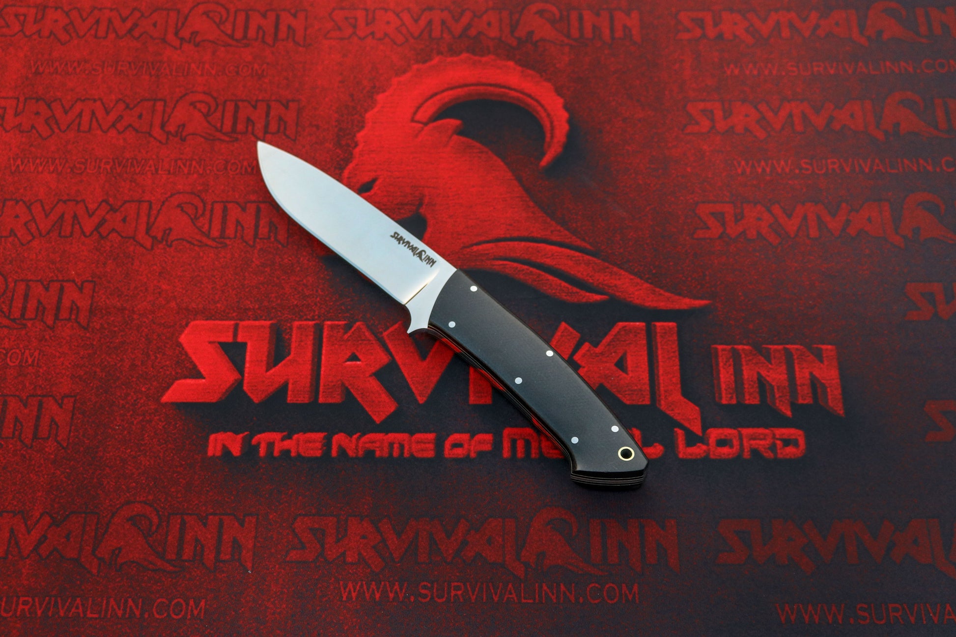 Loveless Drop Point Hunter with tapered tang and stainless steel guard