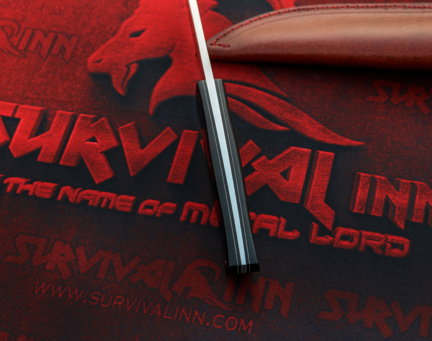 Top-down view highlighting the symmetry and tapered blade of the Loveless design