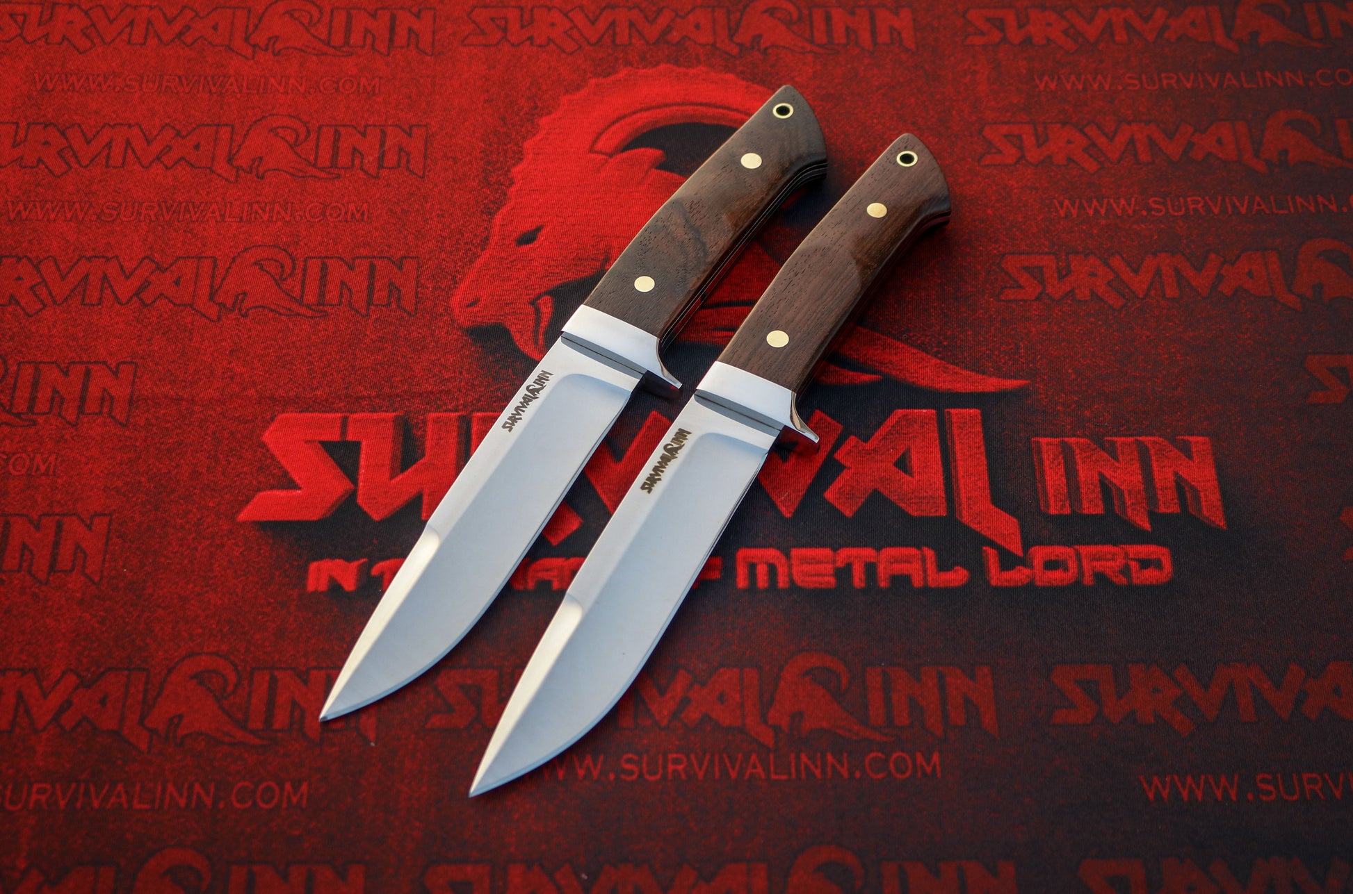 Loveless-style drop point knife comfortably held in the hand, demonstrating ergonomic design for hunting