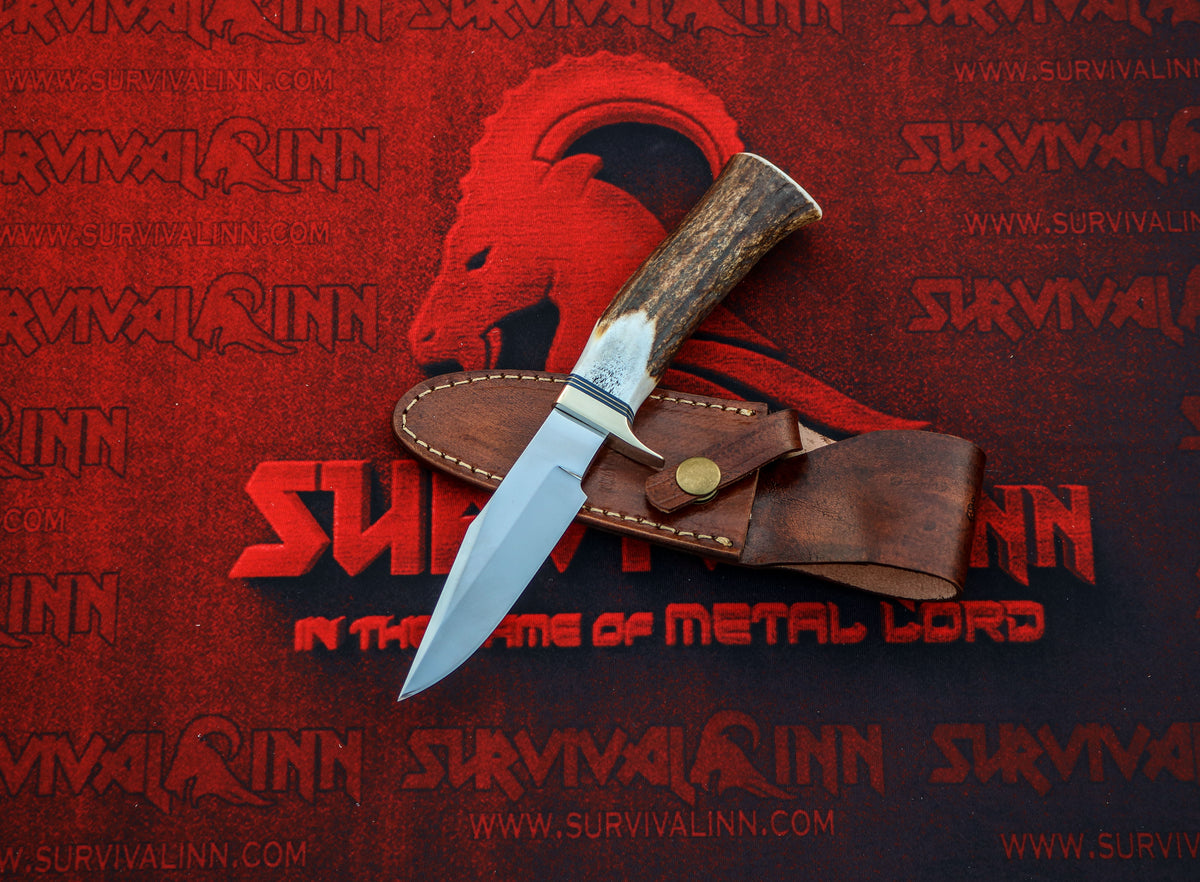 Full view of the Randall Model 8 Trout and Bird stag handle knife highlighting its distinctive antler grip and traditional knife profile.