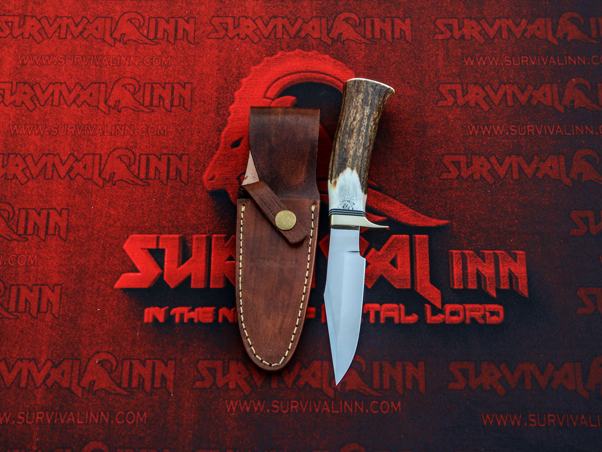 Close-up of the Randall Model 8 Trout and Bird knife blade highlighting its shape, finish, and detailed construction.