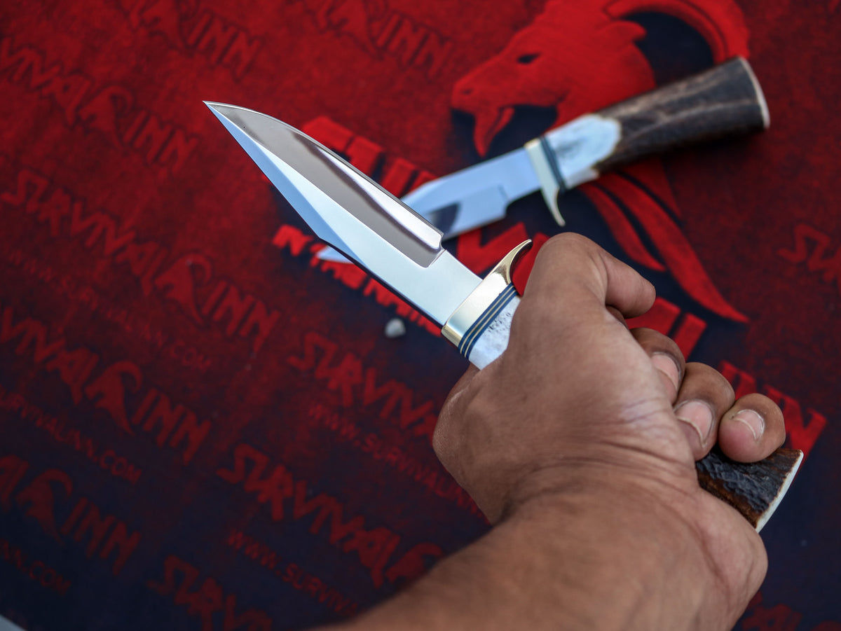 Randall Model 8 Trout and Bird knife with stag antler grip photographed to showcase its handle craftsmanship and classic design.
