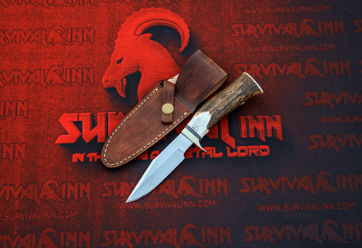 Randall Model 8 Trout and Bird hunting knife showcasing its distinctive blade profile and traditional craftsmanship.
