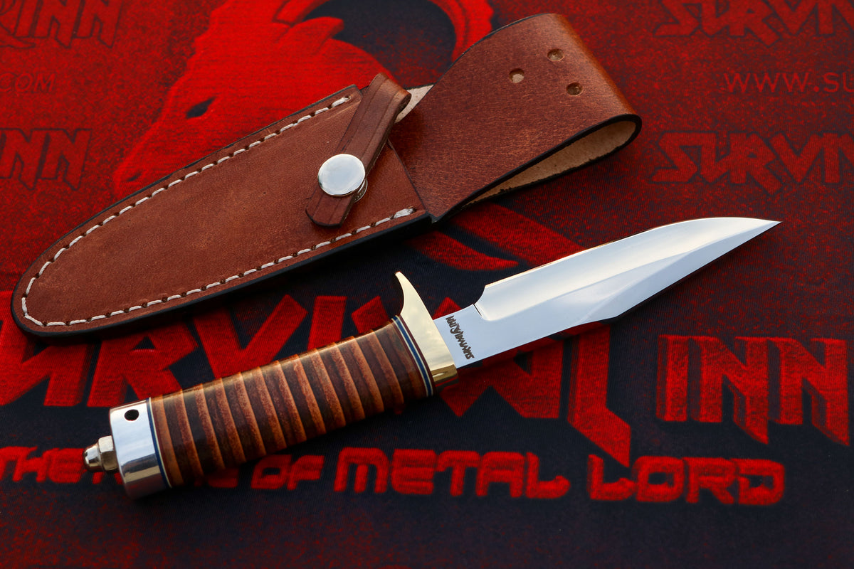 Randall Model 23 Gamemaster knife featuring a standard single brass hilt