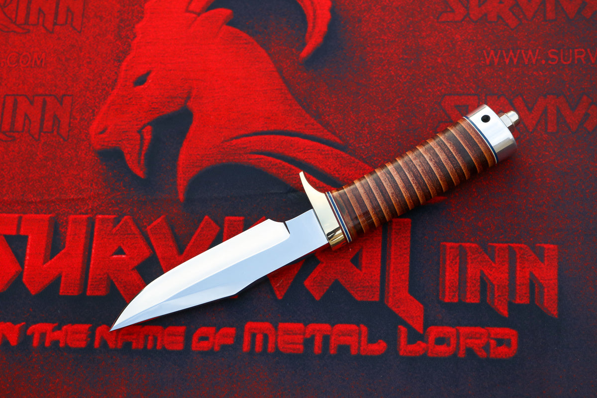 Randall Model 23 Gamemaster knife with heavy-duty cutting top edge and thumb notch
