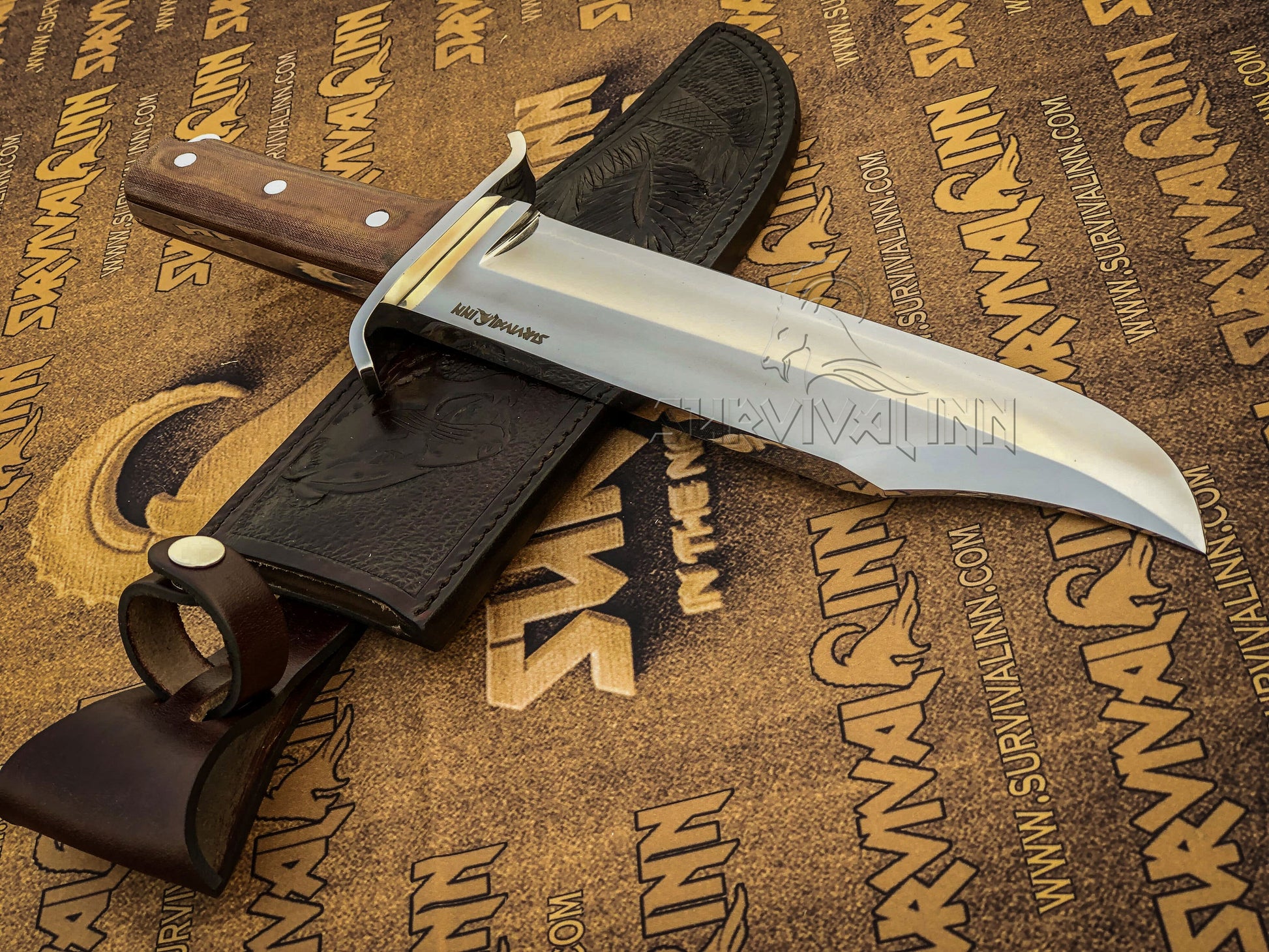 Thick spine of the handmade 5160 steel bowie knife, highlighting the rugged construction for heavy-duty outdoor tasks