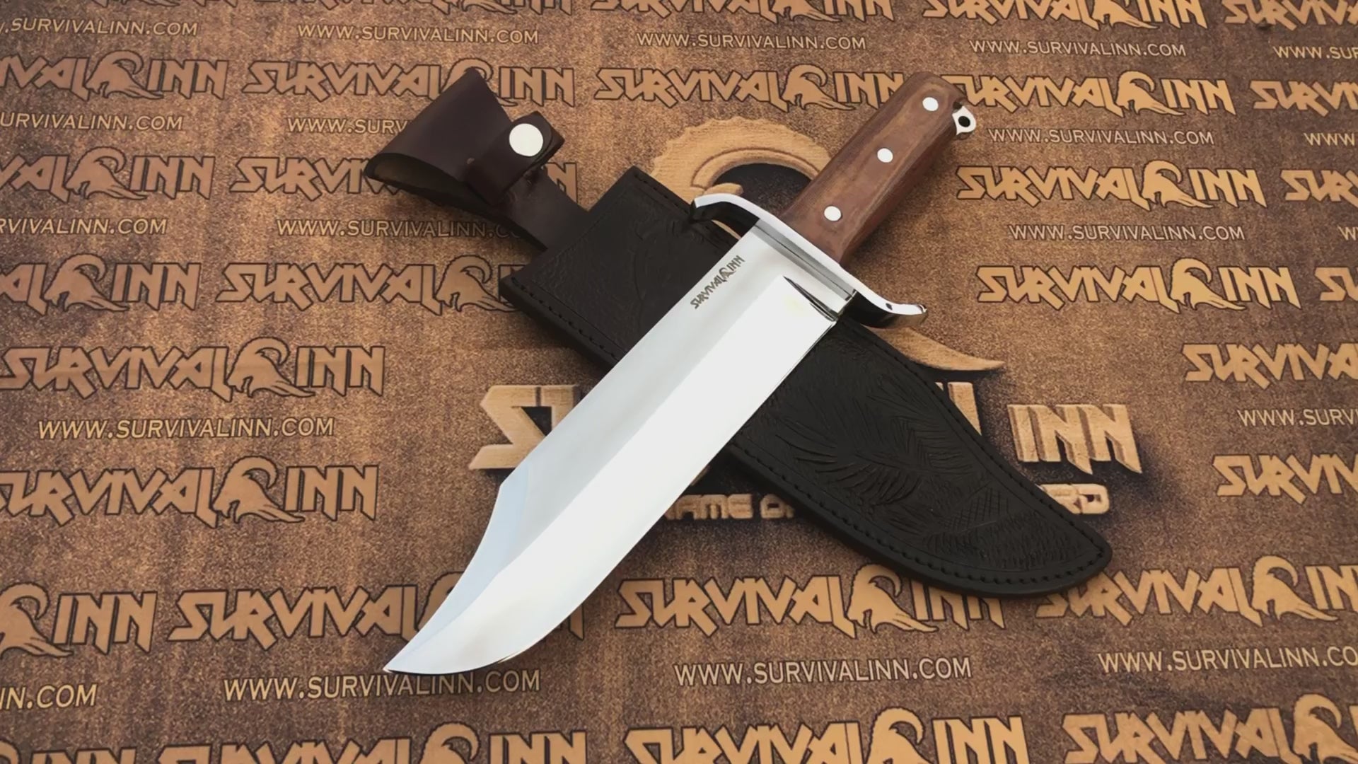 Product hero shot of the handmade 5160 steel bowie knife next to the artisan logo, built to be an heirloom survival tool