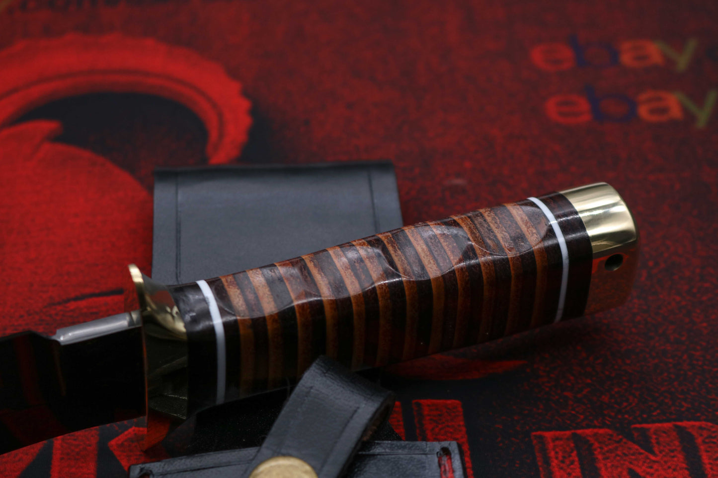 Ergonomic stacked leather grip handle on handcrafted SOG Bowie knife for secure hold