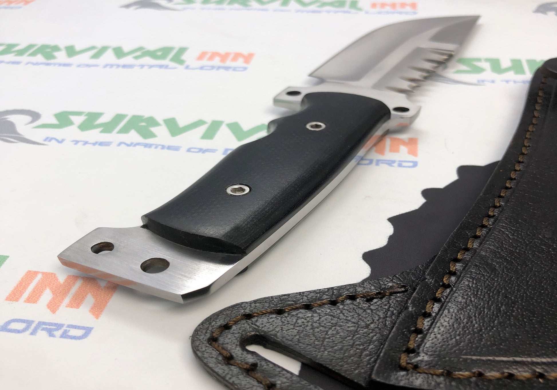 Textured non-slip handle of tactical hunting knife for secure outdoor use